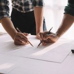 Architect construction engineer plan on hard project at work.